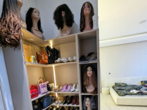 Rack with hair, shoes and bags