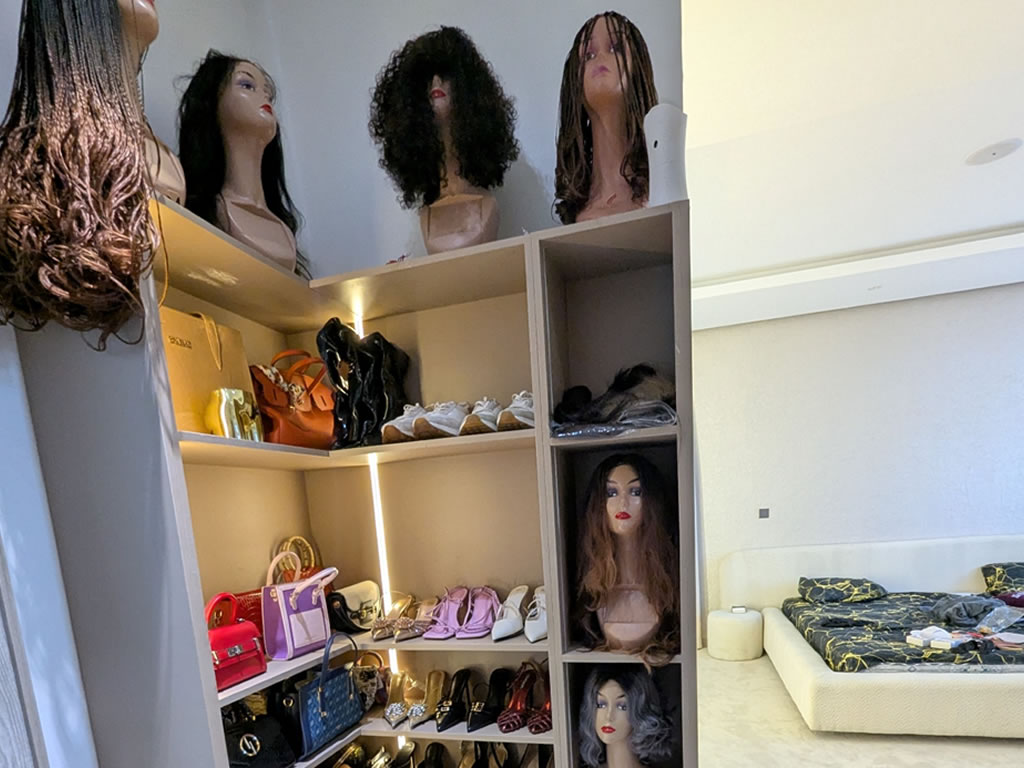 Rack with hair, shoes and bags