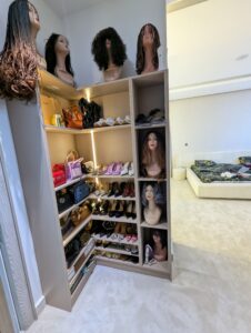 Rack with hair, shoes and bags