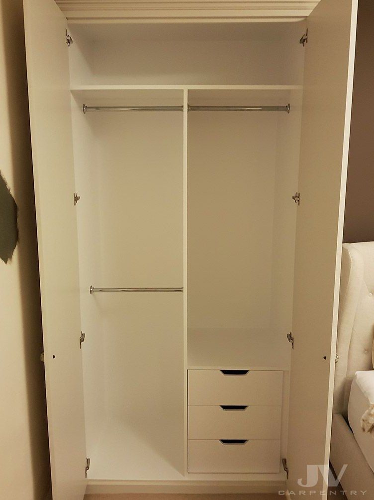 simple wardrobe design for Nigerian homes in a modern bedroom