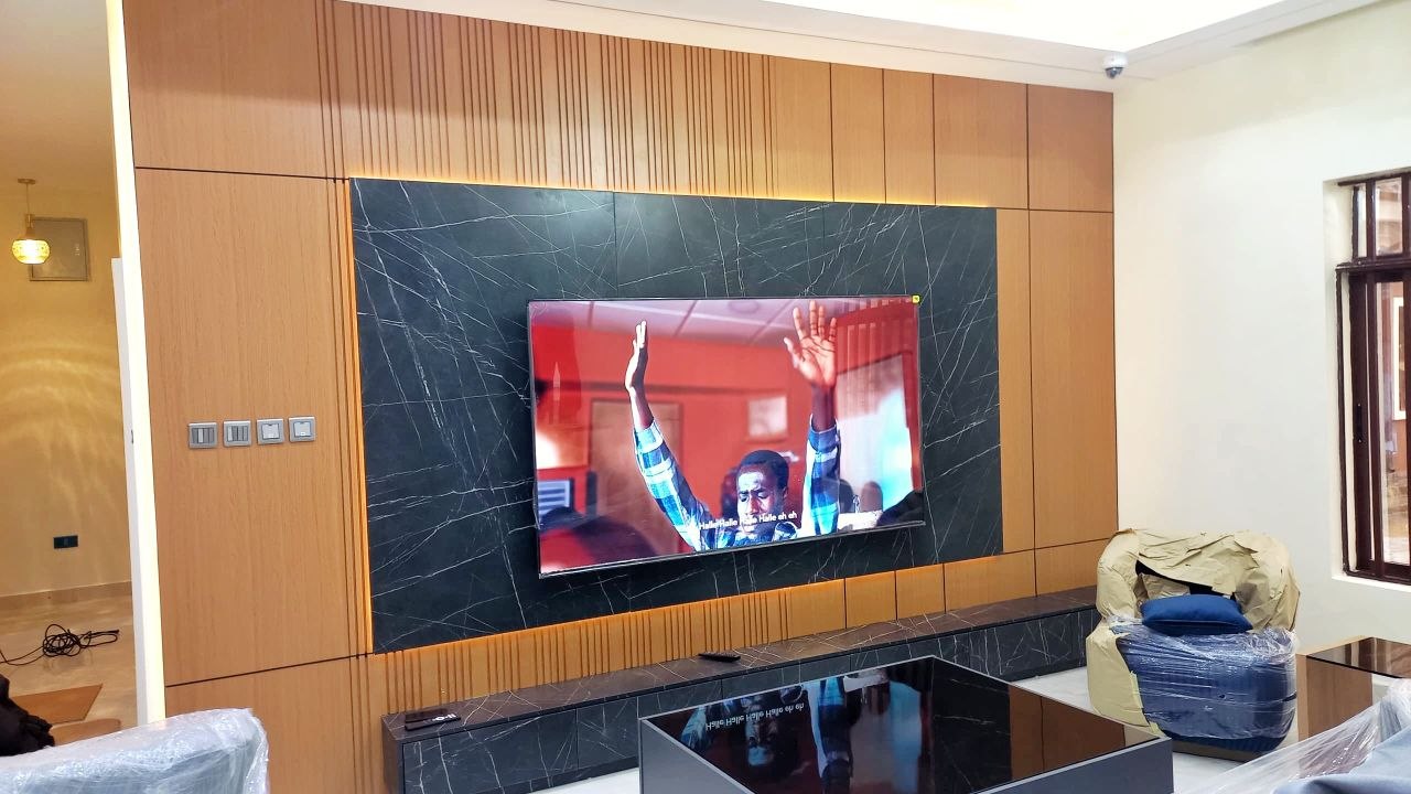 custom TV media unit with integrated panel and sockets