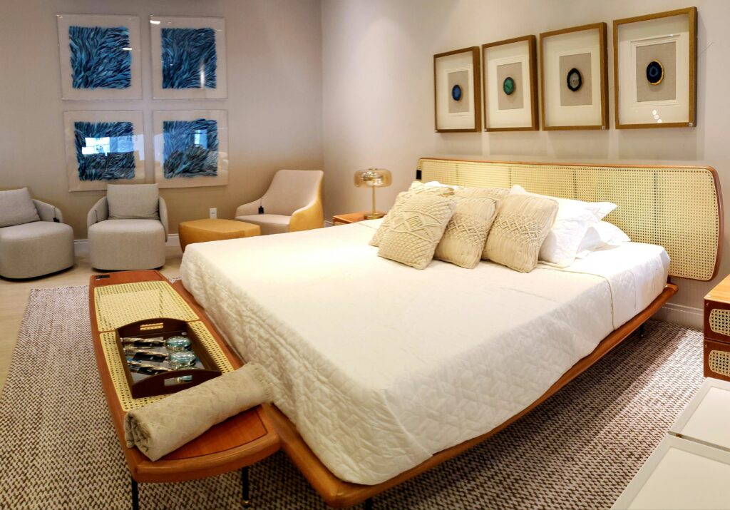 A luxury custom upholstered 6x6 king-size bed frame featuring a bespoke extended velvet headboard wall panel with integrated LED architectural lighting.