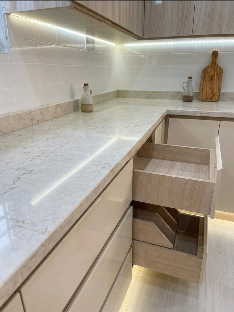 Modern cream and white high gloss custom kitchen cabinets by Joanswood Creations.